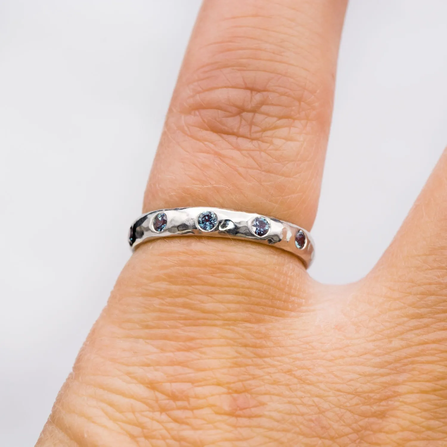 Narrow Hammered Texture Wedding Band With Flush Set Alexandrites